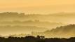 Early morning in May looking northeast towards Whitby Abbey across the Esk Valley from High Burrows Farm, North Yorkshire.